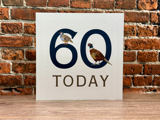 Card with '60 Today' text and pheasant illustrations against a brick wall background