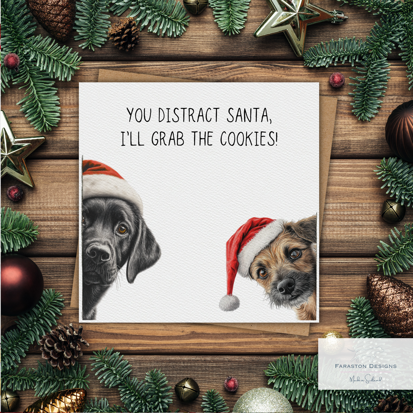 Black Labrador and Border Terrier Christmas Card – You Distract Santa, I’ll Grab the Cookies!